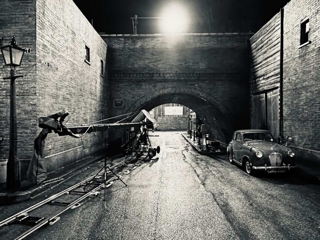 Jimmy Jib rigged on track beneath the railway arch on the Call the Midwife backlot at night