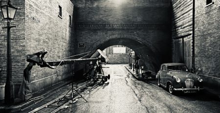 Jimmy Jib rigged on track beneath the railway arch on the Call the Midwife backlot at night