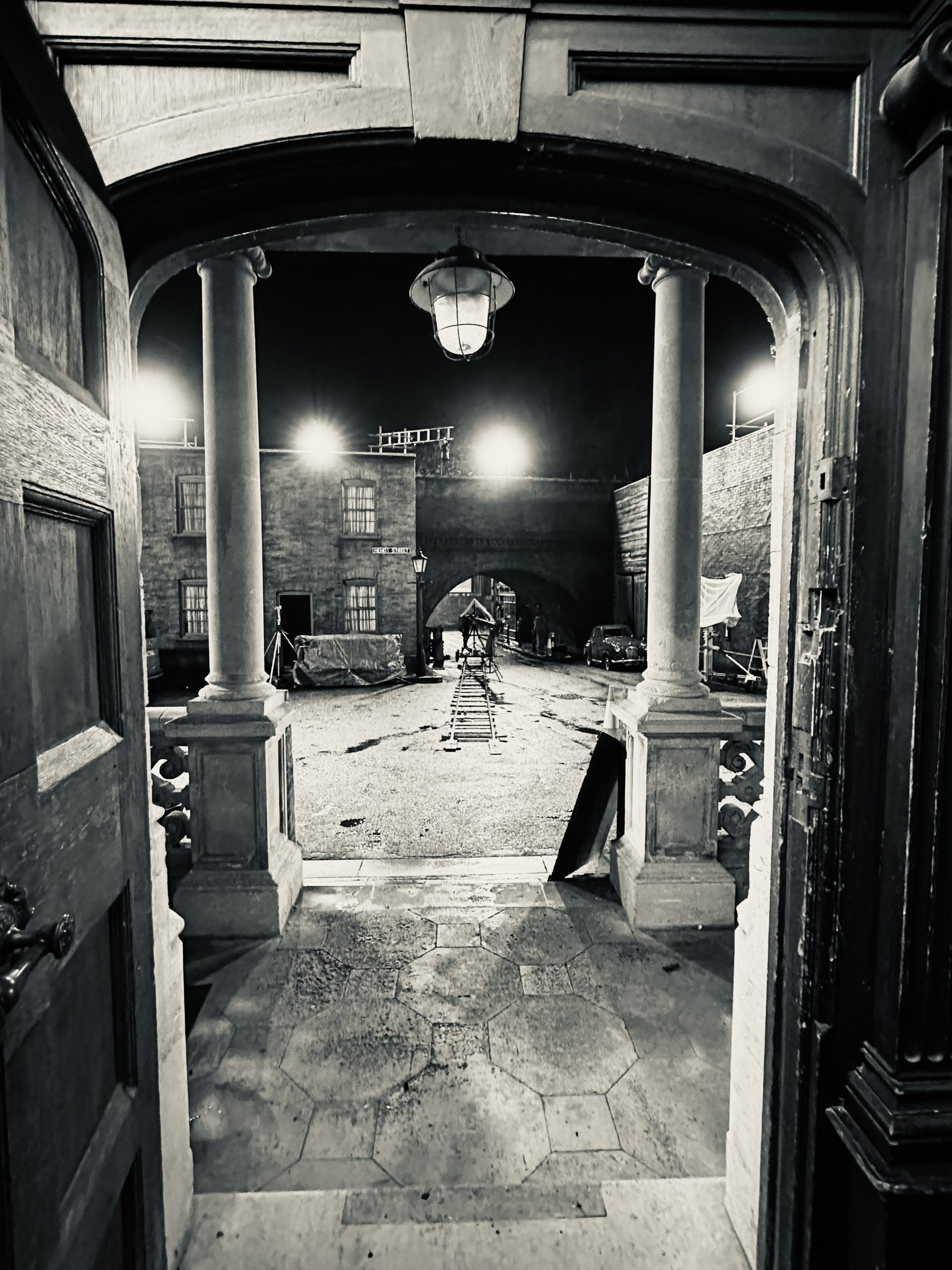 Looking out from the doorway of Nonnatus House onto the street set